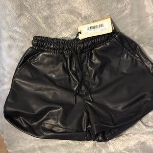 Black short shorts.  NWT